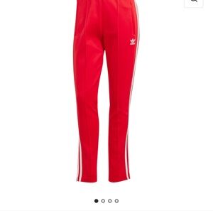 Adidas Women's Red Joggers with White Stripes
